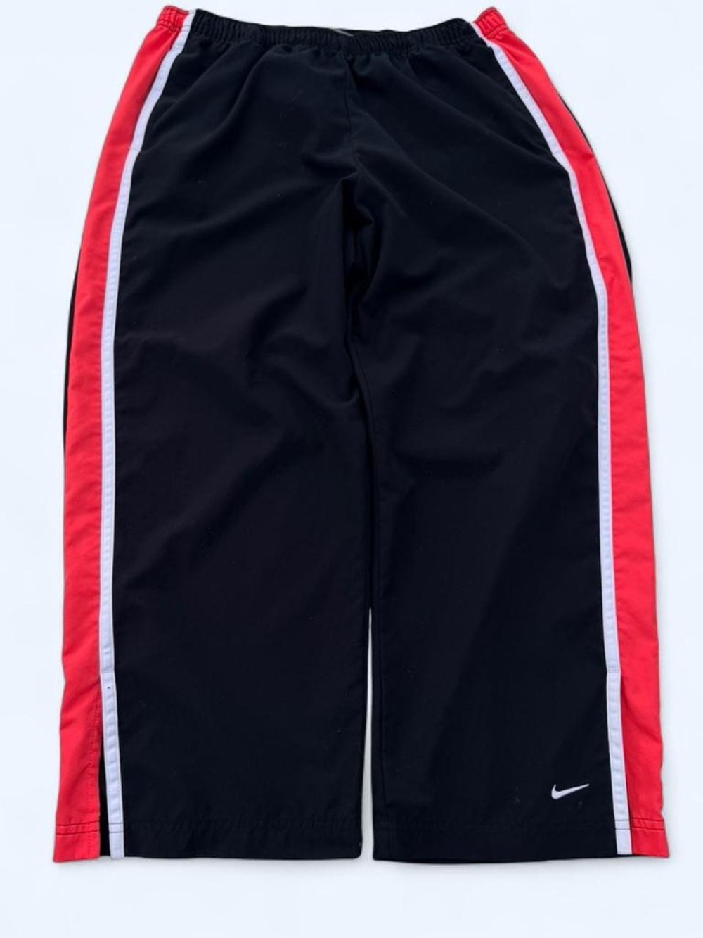 Nike Navy Track Pants with Red Side Stripes and White Trim